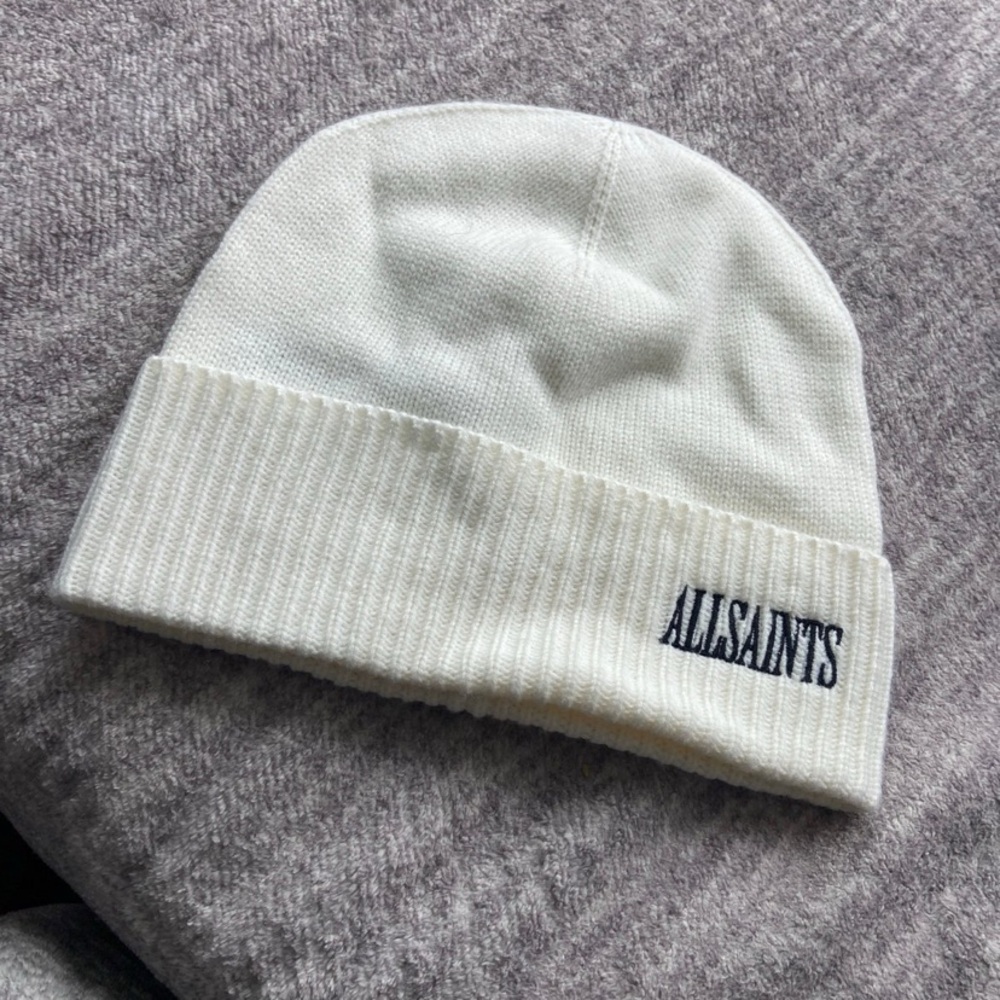 All Saints cream colored winter beanie hat